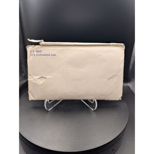 1974 U.S. Mint Uncirculated Coin Set w/ Envelope – 9 Coins, Red & Blue Sleeves
